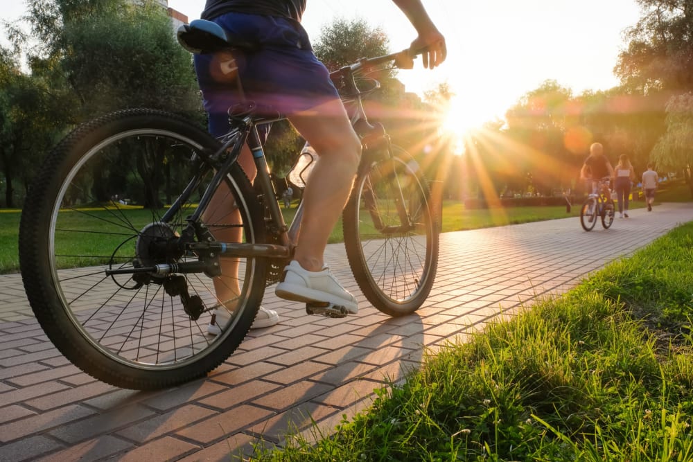 Residents out for a bike ride near Thea Apartments in Tacoma, Washington