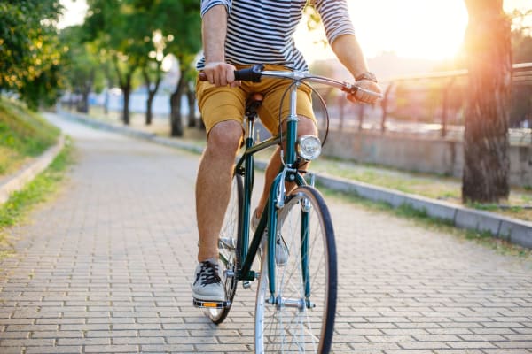 A resident rides his bike on path near Chesterfield Flats, North Chesterfield, Virginia