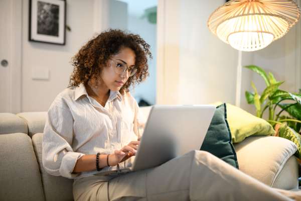 Resident doing online rental payment at Hamlet Court Apartments in Rochester, New York