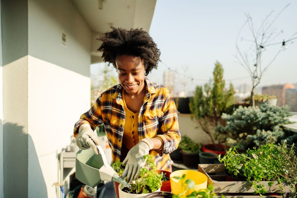 Residents watering her plants at Eastbridge in Seattle, Washington