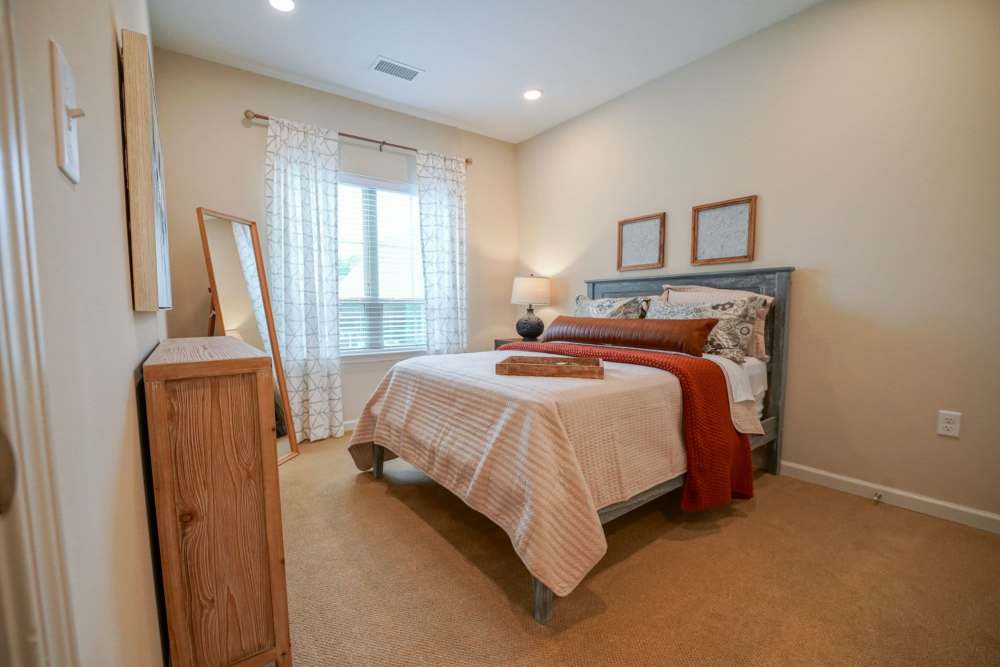 Spacious and comfortable bedroom at Harmony at Bellevue in Nashville, Tennessee