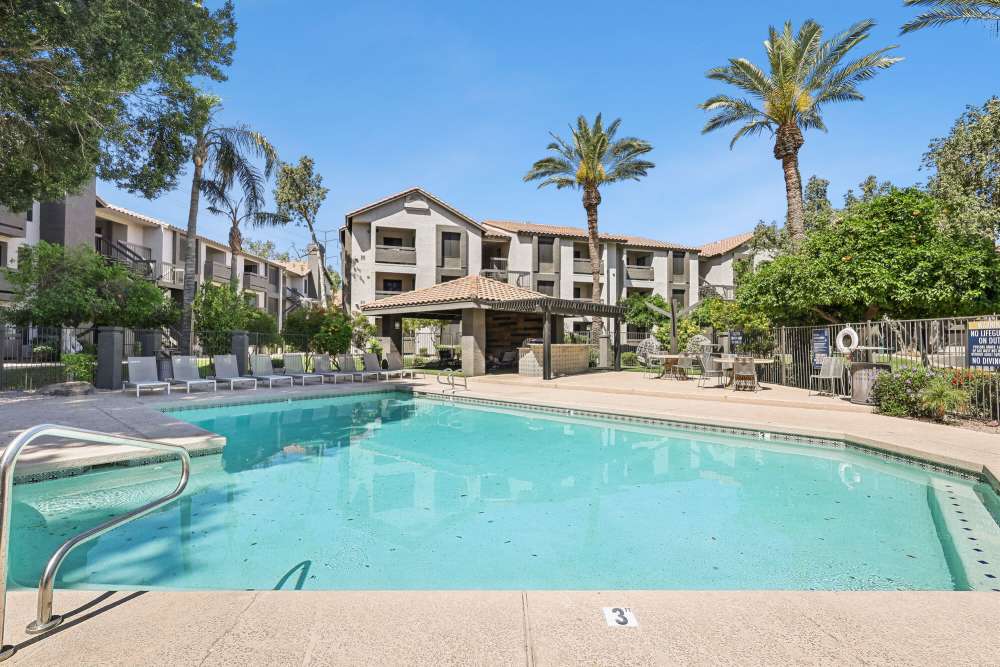 Swimming pool with lounge chair at Strada in Tempe, Arizona