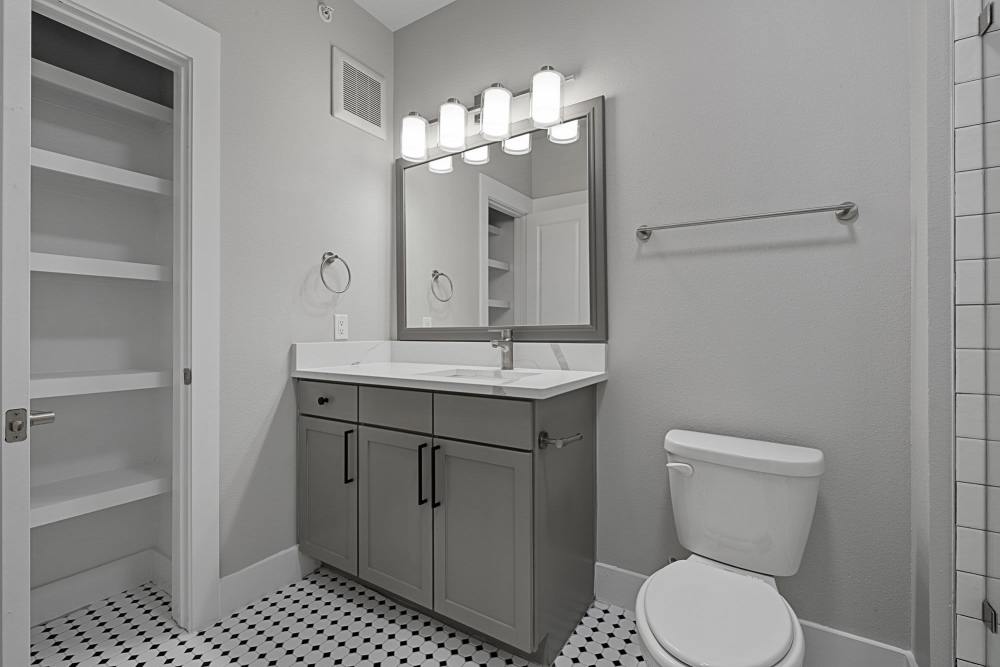 Bathroom with tile flooring at The Standard in Dallas, Texas