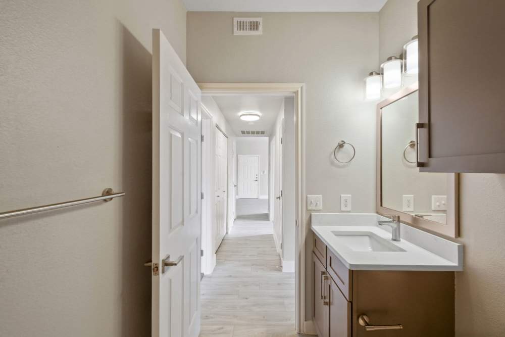 Bathroom with mirror at Cayman, Universal City, Texas