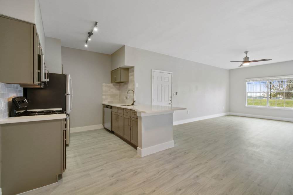 Open plan kitchen with view of living area at Cayman, Universal City, Texas