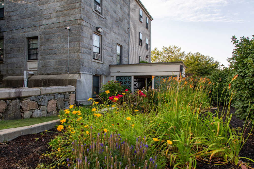 Building exterior with decent plantation at Grinnell Mansion in New Bedford,Massachusetts