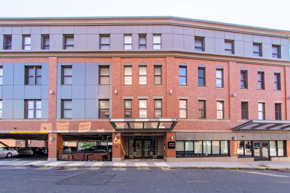 Exterior of the building at Harbor Village in Gloucester, Massachusetts