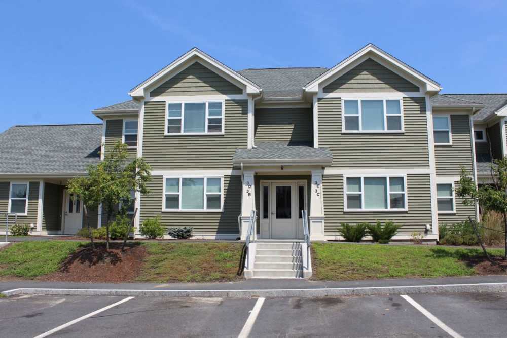 Modern apartment building exterior at Stony Brook Village in Westford, Massachusetts