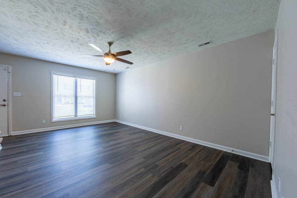 Unfurnished bedroom with ceiling fan at Cape Fear Townhomes in Fayetteville, North Carolina