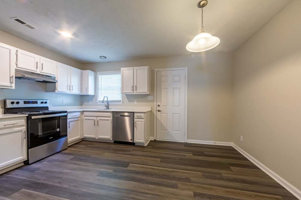 Modern apartment kitchen at Cape Fear Townhomes in Fayetteville, North Carolina