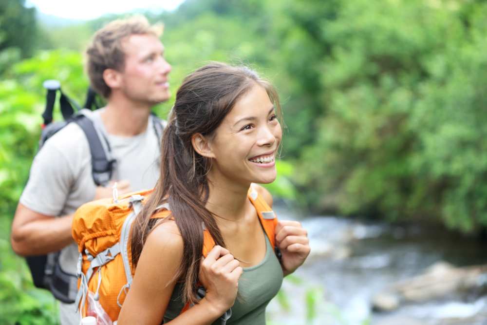 Couple enjoying nature near Na Kahua Hale O Ulu Wini in Kailua Kona, Hawaii