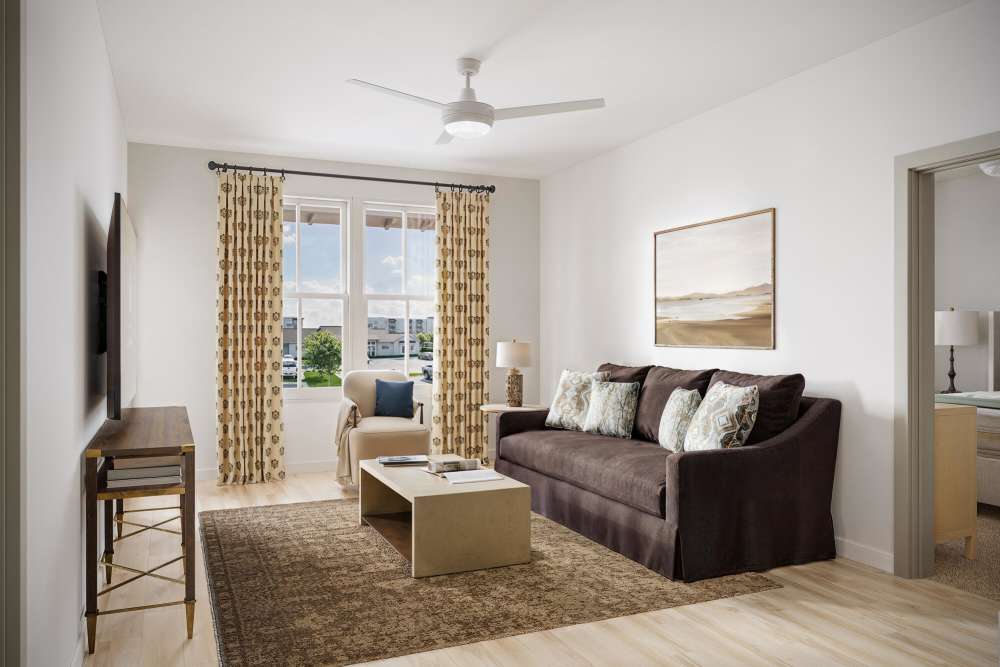 Cozy living room with modern furnishings at Romero Apartments in Pensacola, Florida