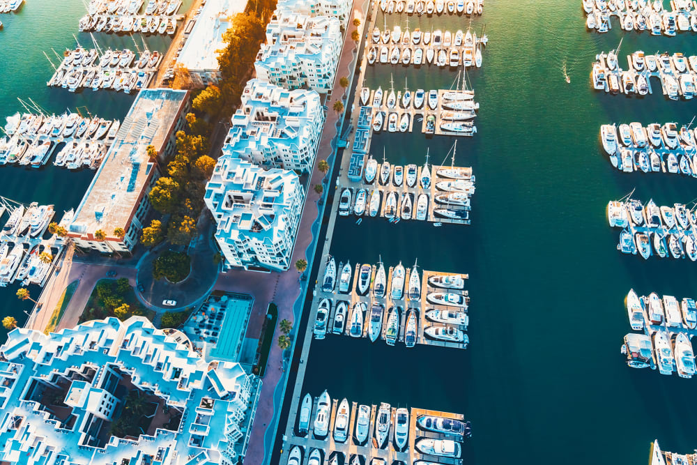Marina boats at Harborside Marina Bay Apartments in Marina del Rey, California