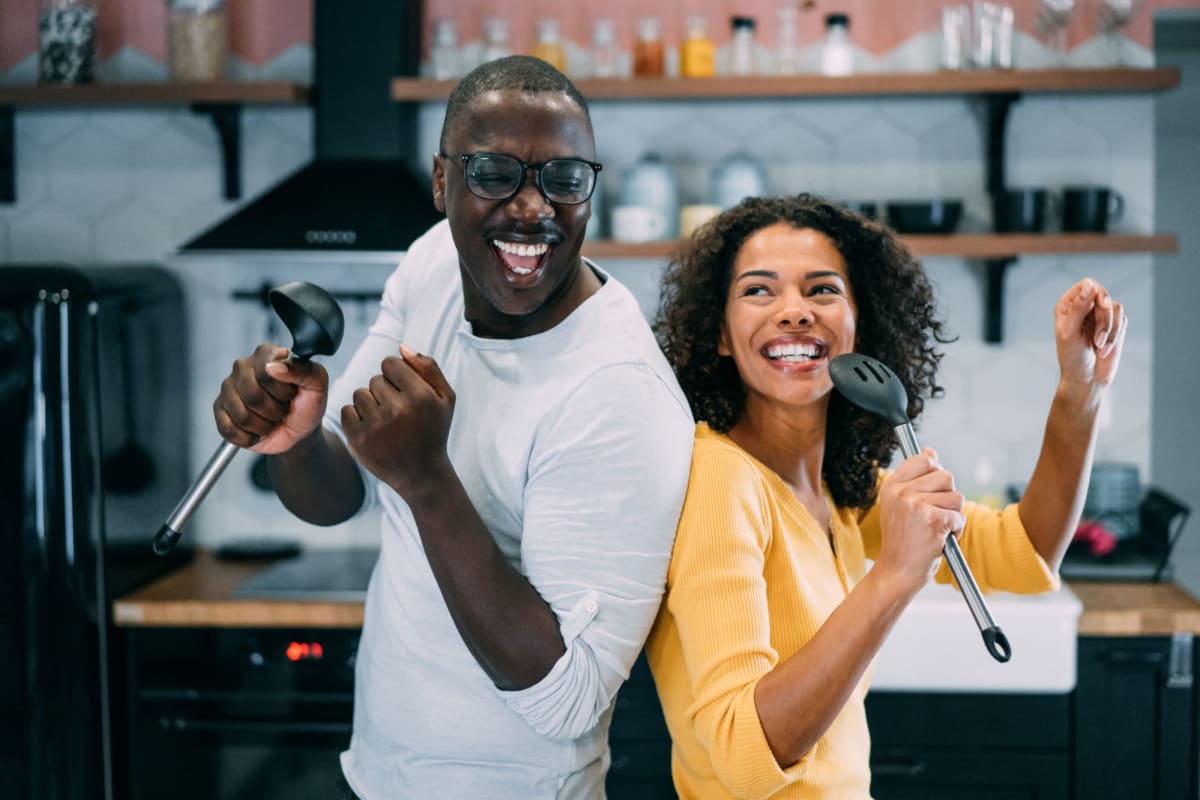 Residents dancing on their kitchen at Parallel 36 at Liberty in Athens, Alabama