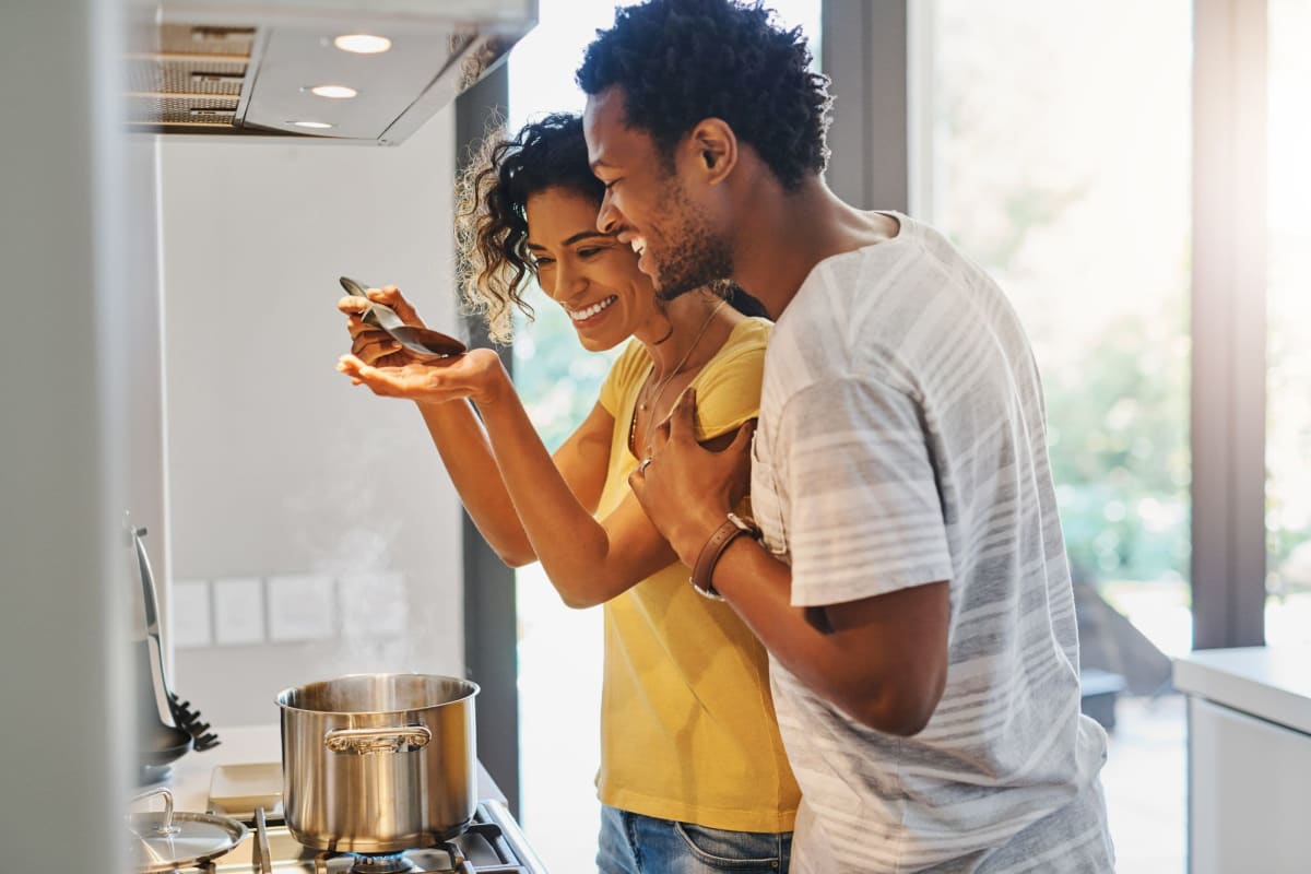 Residents prepare a delicious meal in their kitchen at Los Robles Apartments, Thousand Oaks, California