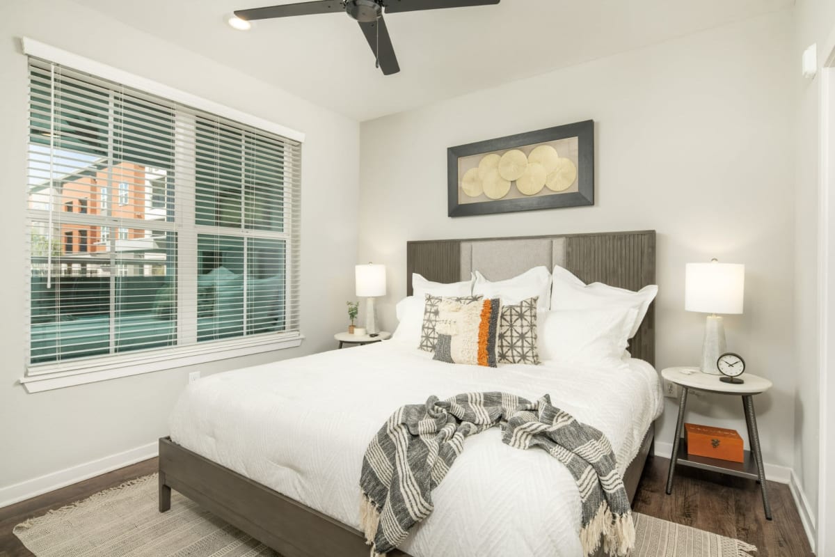 Bedroom with wood-style floor at The Wyatt, Gilbert, Arizona