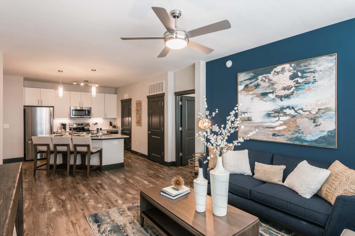 Spacious model apartment with wood-style flooring at Vintage Gateway, Murfreesboro, Tennessee