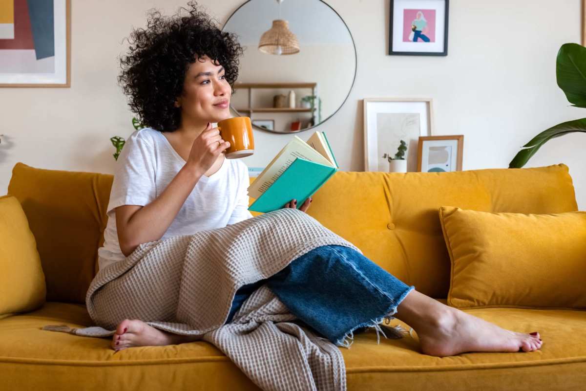 A resident enjoys a cup of coffee in her apartment at Vintage Gateway, Murfreesboro, Tennessee