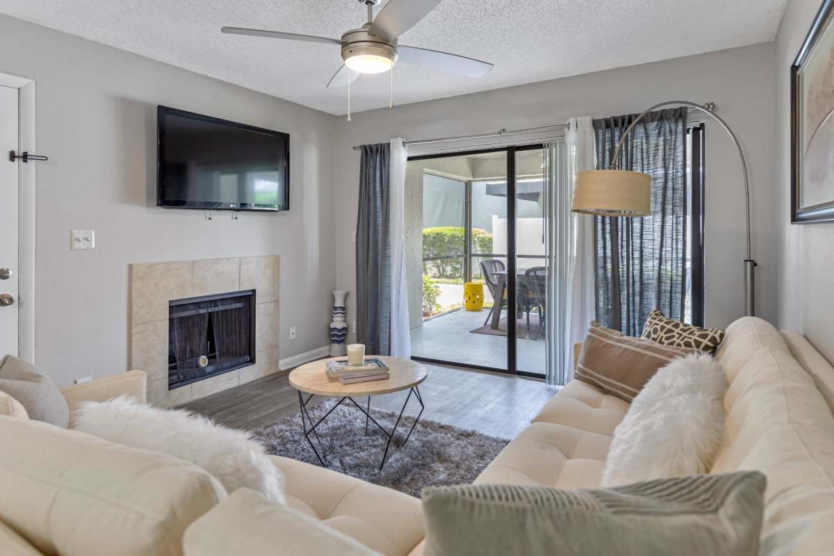 Living room with wooden flooring at Stella Boca Raton Apartments, Boca Raton, Florida