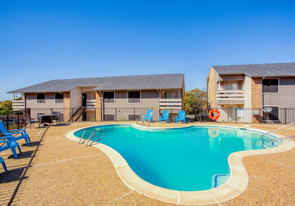Outdoor swimming pool at The Summit Apartments in Athens, Texas