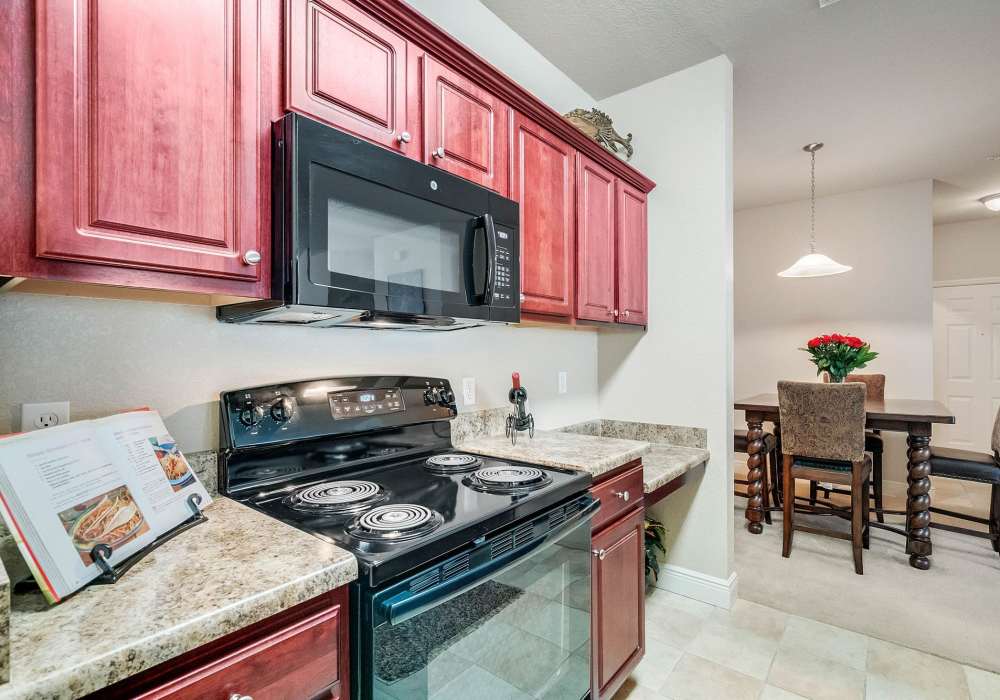Cozy kitchen at Victoria Park Apartments in Davenport, Florida