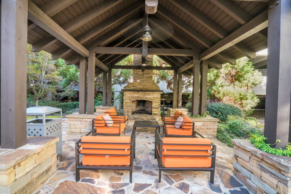 Community lounge area with a fireplace at Drift Dunwoody in Dunwoody, Georgia