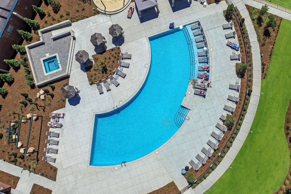Rendering aerial view of sparkling swimming pool at Loray Mill Lofts in Gastonia, North Carolina