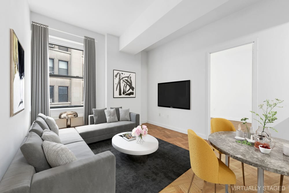 Living room with beautiful views at Twenty Exchange in New York, New York
