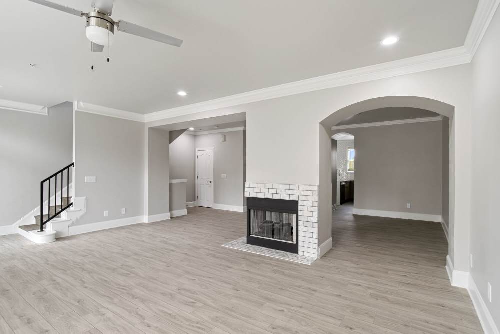Cozy living room with firepit at Rock Creek at Ballantyne in Charlotte North Carolina