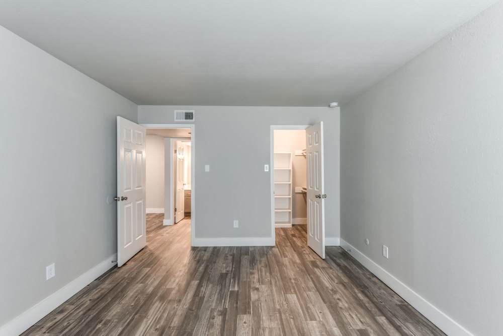 View of closet and bathroom from unfurnished bedroom at Warwick at Westchase in Houston, Texas