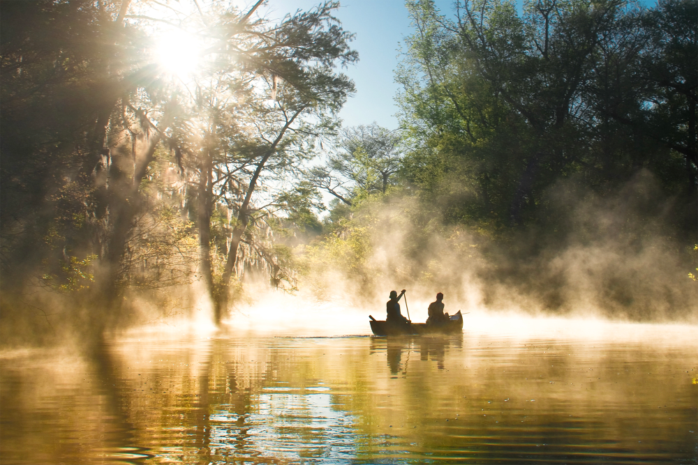 Residents on an early morning canoe ride near Gardenbrook Apartments in Columbus, Georgia