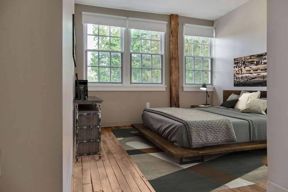 Bedroom with windows at Shoe Shop Place in Middleboro. MA