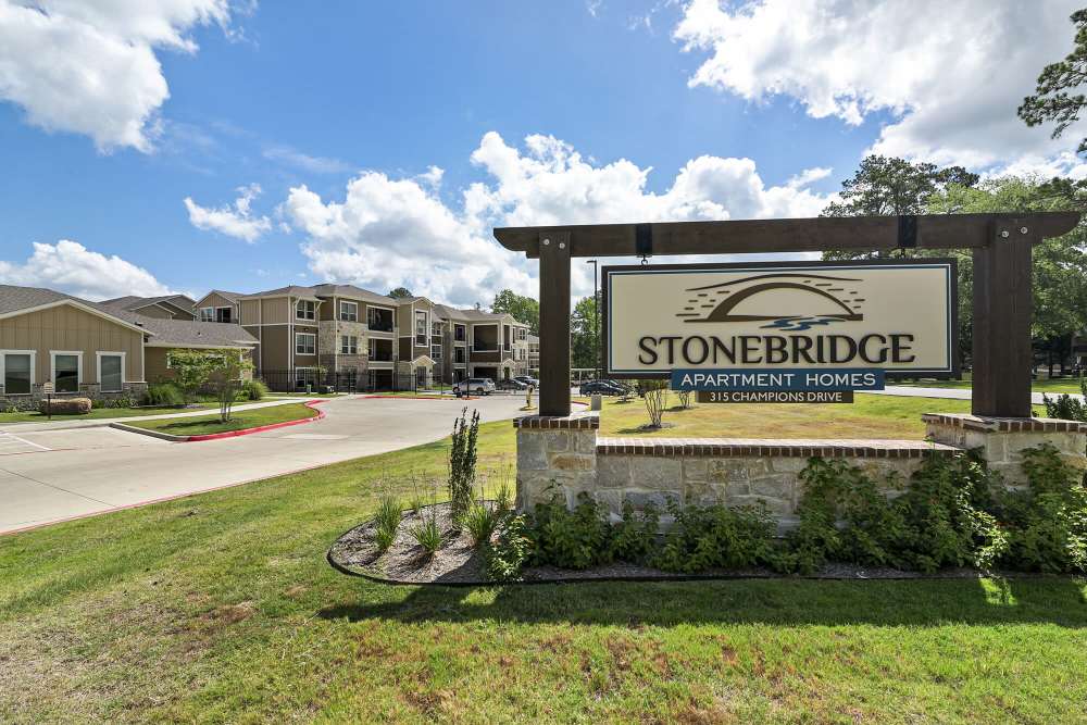 Community signage at Stonebridge Apartment Homes in Lufkin, Texas