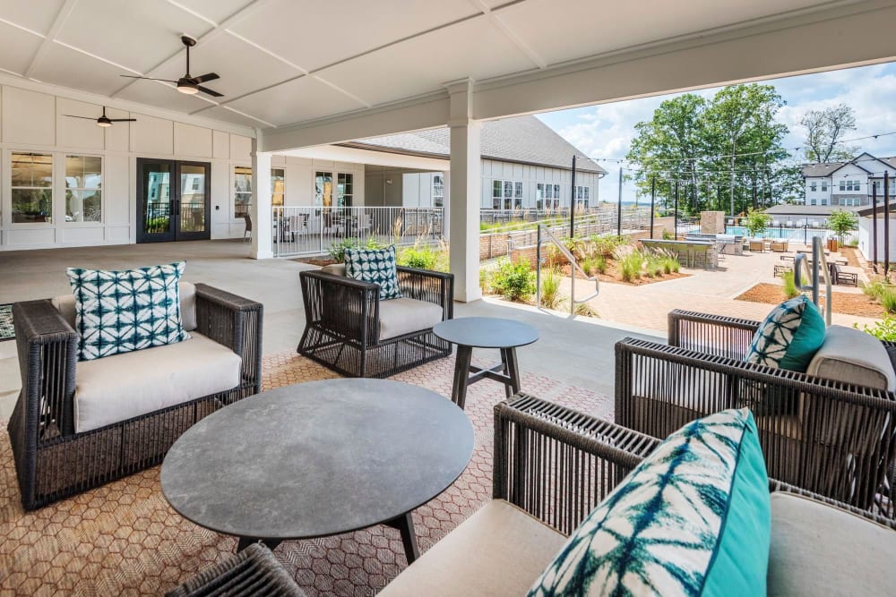 Outdoor clubhouse lounge seating at The Collins in Charlotte, North Carolina