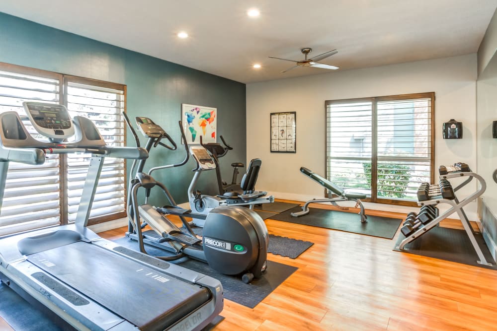 Fitness center with plenty of individual workout stations at Royal Ridge Apartments in Midvale, Utah