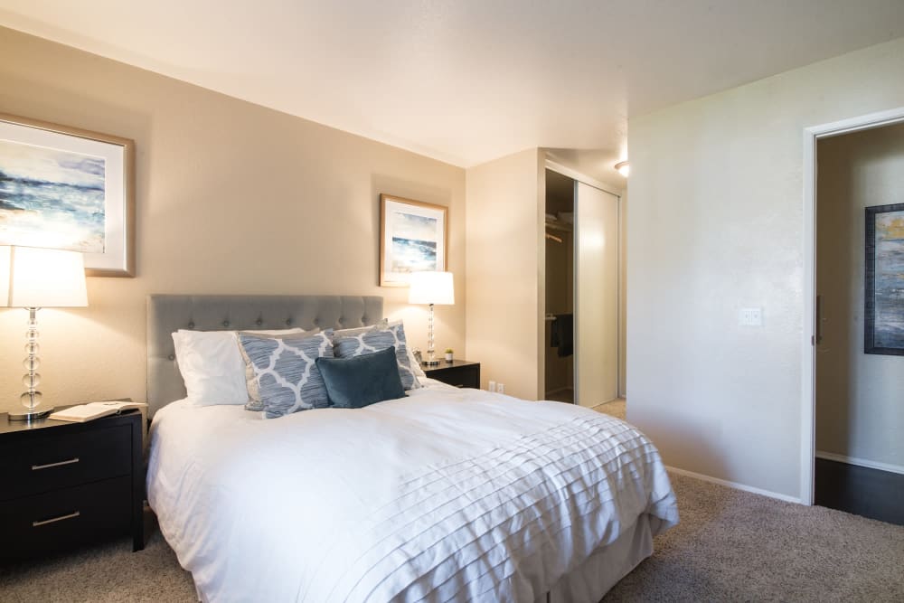 Decorated master bedroom with a large closet at Terra Nova Villas in Chula Vista, California