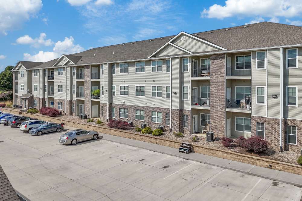 Charming apartments with lush landscaping and modern architecture at Pointe 28 in Ankeny, Iowa.