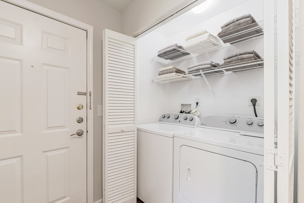 Washer and dryer closet at Eagle Rock Apartments at Freehold in Freehold, New Jersey
