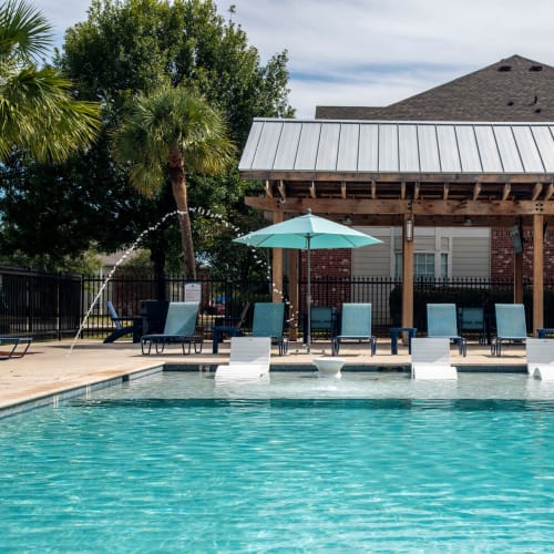 The resort-style swimming pool at The Highland Club in Baton Rouge, Louisiana