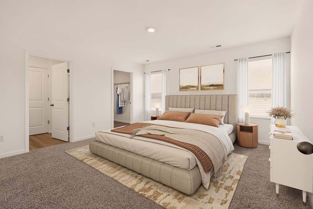 Bedroom with cozy decor at Brixin Sonora in Fort Wayne, Indiana