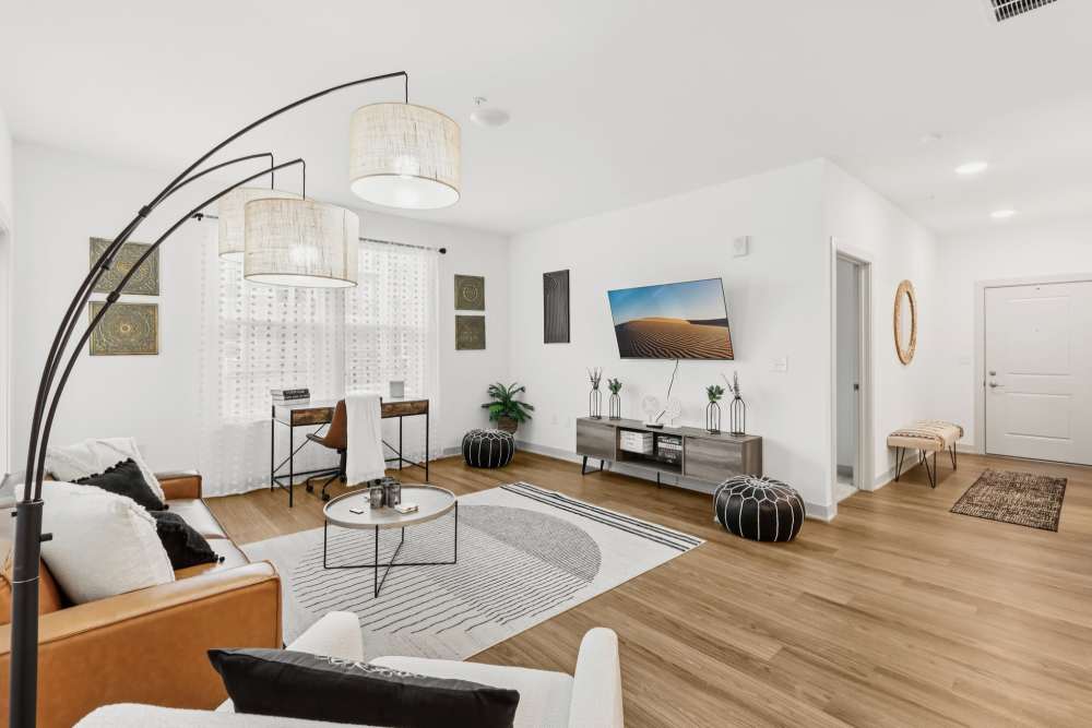 Living room into hallway at at Riley Crossing Apartments 