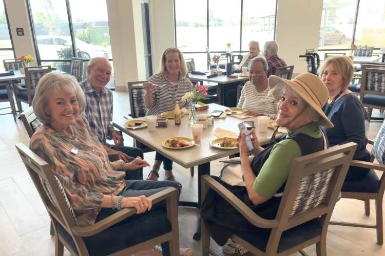 Resident dining at Watermere at Firewheel in Garland, Texas