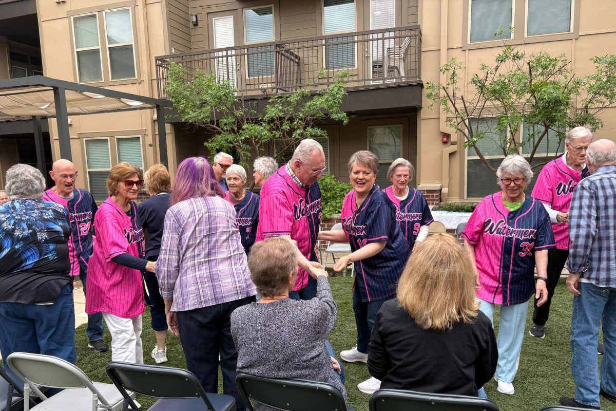 Residents gardening at Watermere at Firewheel in Garland, Texas
