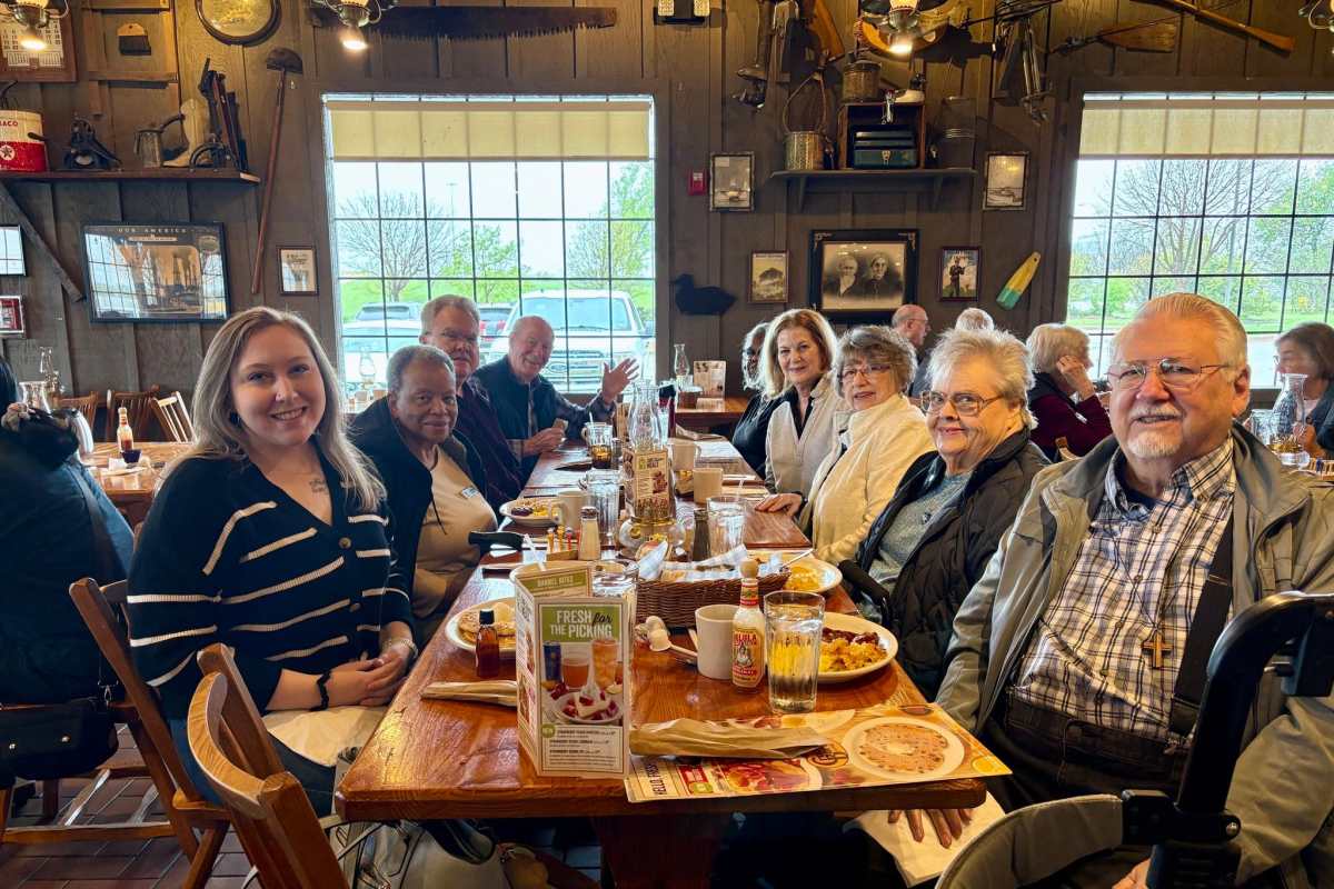 Residents enjoying dinner at Watermere at Firewheel in Garland, Texas.