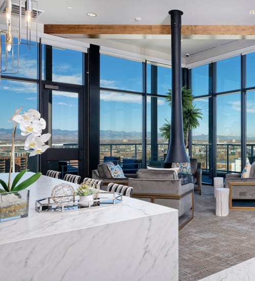 Floor to ceiling windows at Pool table and lounge at Civic Lofts in Denver, Colorado