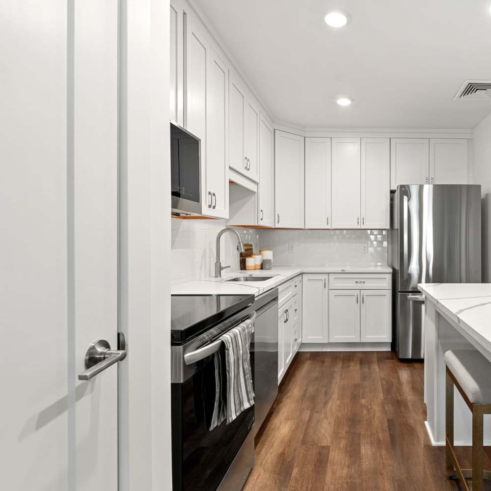 Kitchen with wood flooring at Henrietta Place, Rochester, New York