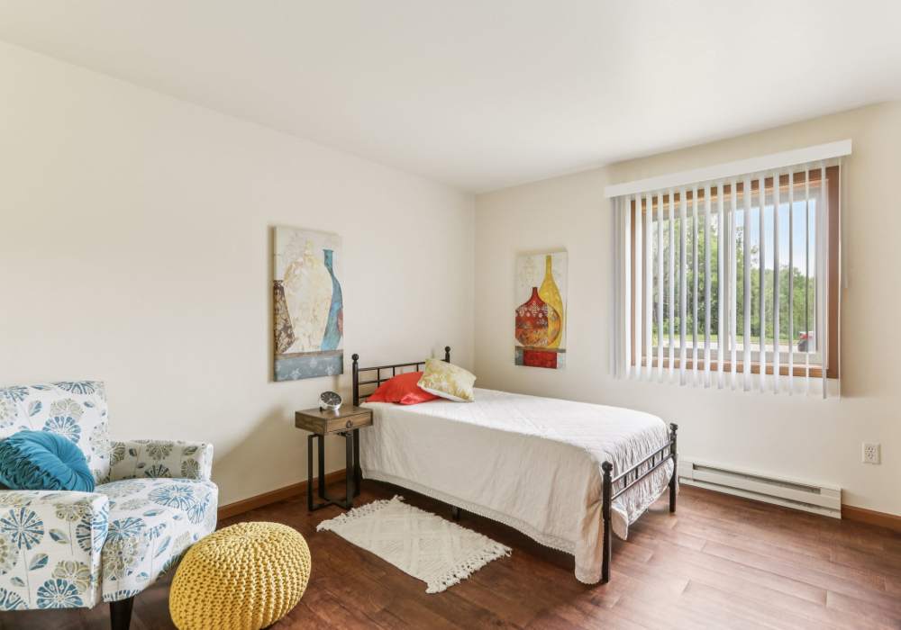 Bedroom at Woodfield Heights Apartments in Waukesha, Wisconsin