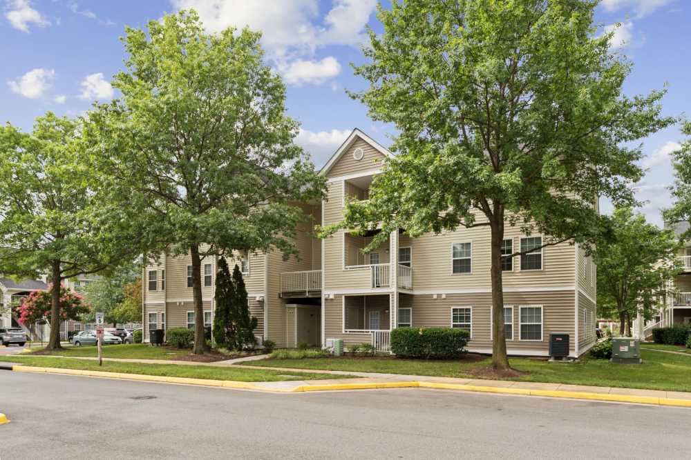 Exterior of apartments with walkway at Dulles Center Apartments in Herndon, Virginia