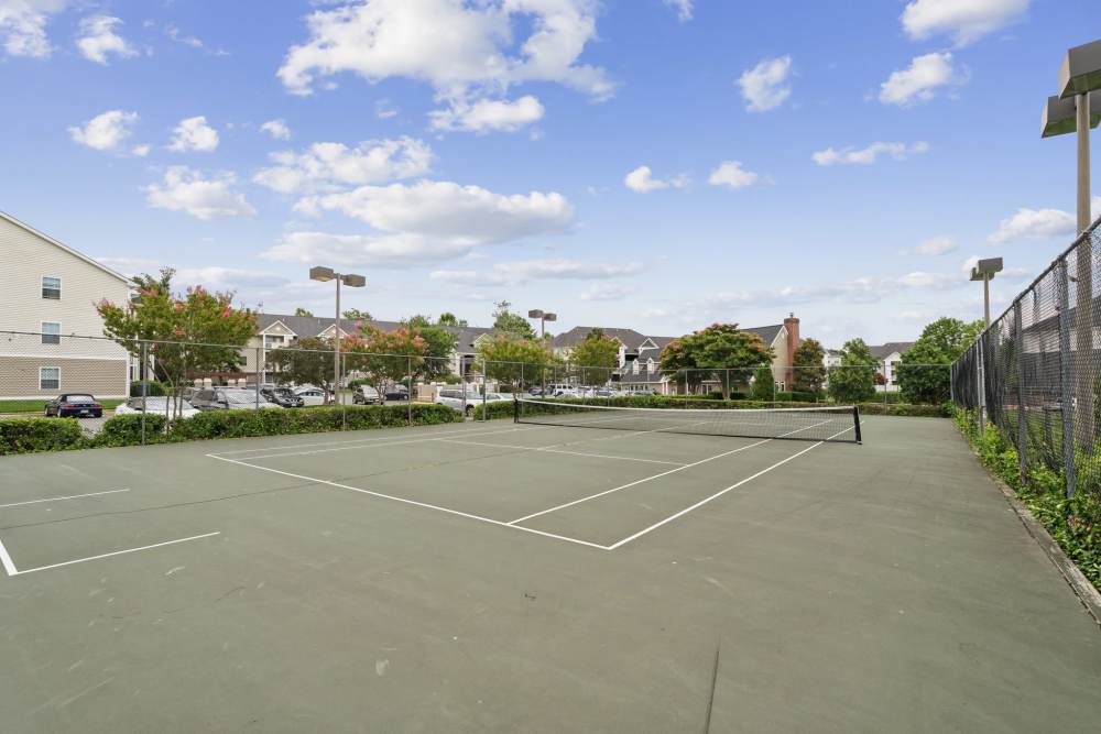 Community tennis court at Dulles Center Apartments in Herndon, Virginia