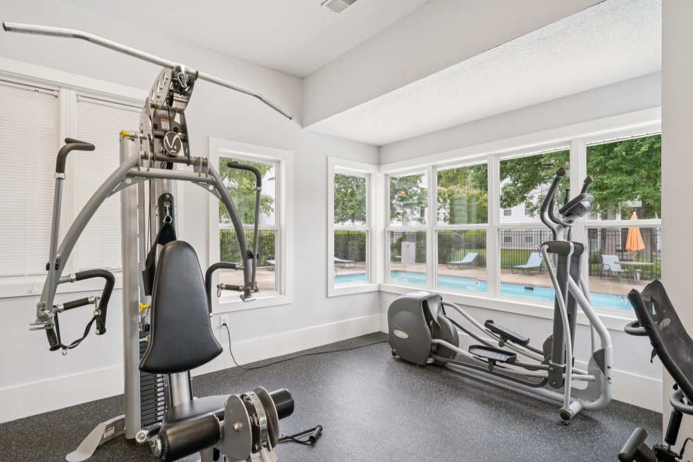 Fitness center with weight machine at Pilot House in Newport News, Virginia